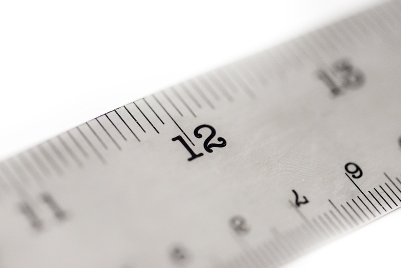 still life, cut out, photography, studio shot, black color, distance, white color, engineering, ruler, imperial, drafting, length, shallow, math, paper