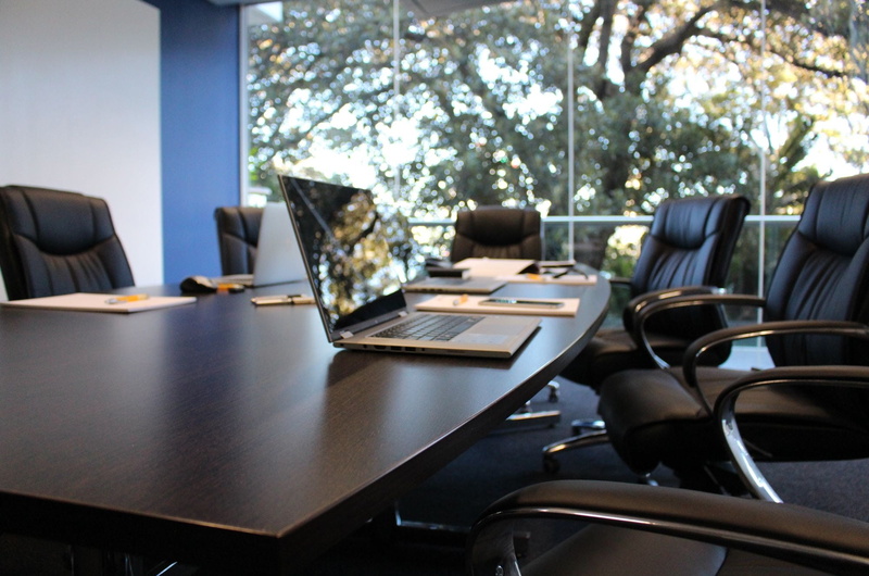 no people, armchairs, swivel, board room, seat, tree, corporate business, window, absence, business, day, office, laptop, meeting, paper, paperwork, gray
