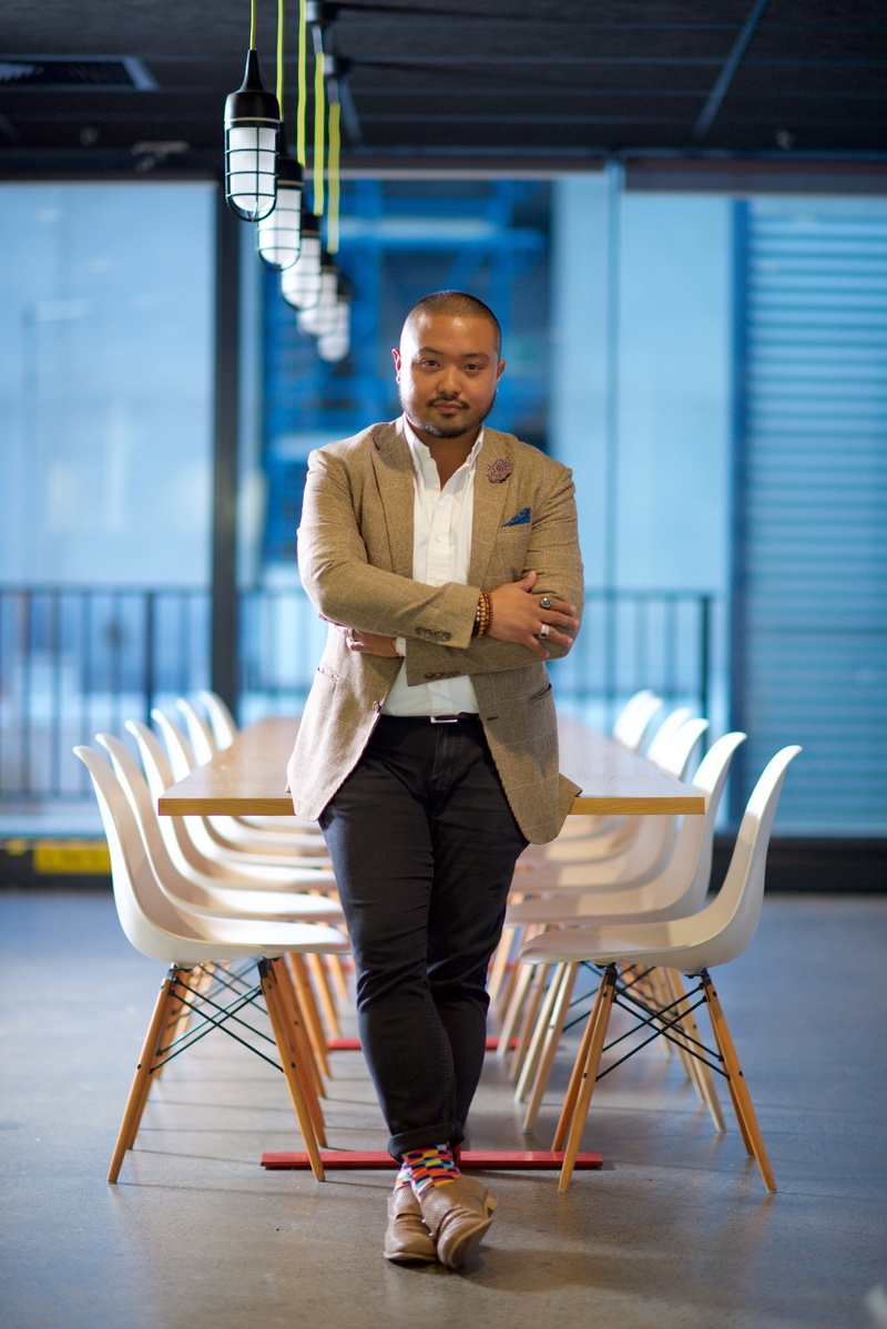 one person, fashion, looking at camera, meeting, males, business person, young adult, work, smiling, portrait, guy, office, occupation, boardroom, full length