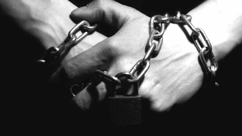 human finger, sax, iron, indoors, oboe, key ring, ligament, human body part, holding, black, metal, attachment, steel, connection, finger, human hand, one person