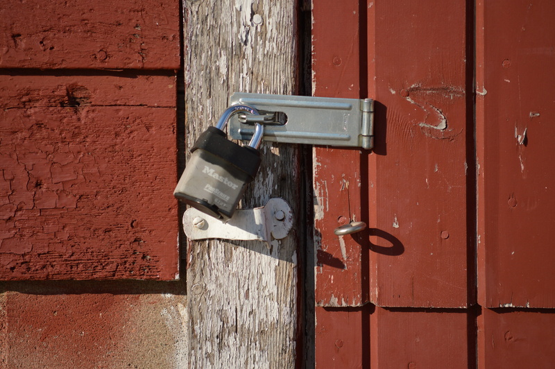 entrance, close-up, no people, day, latch, wall - building feature, closed, protect, building exterior, wood - material, secrecy, architecture, door, outdoors