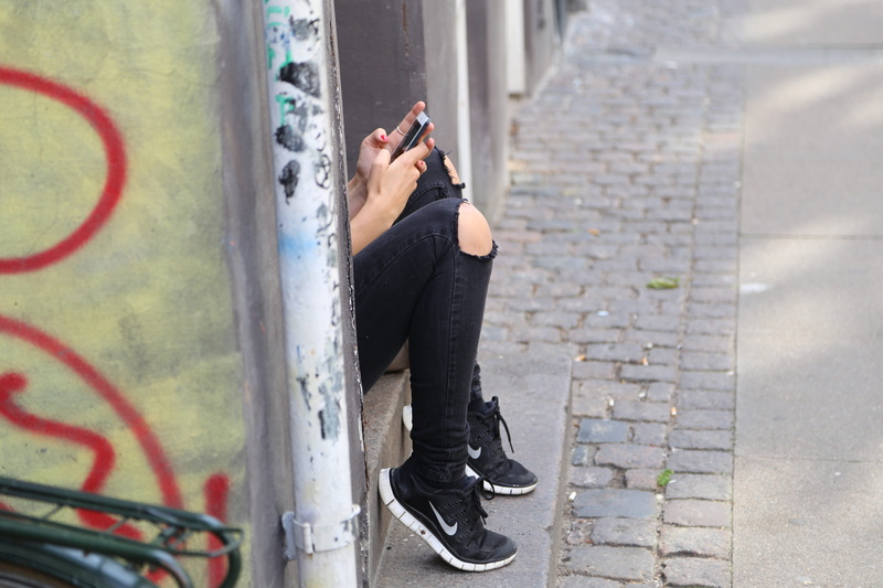 full length, street, men, mobile phone, human arm, information, whatsapp, teen, black, wall - building feature, lifestyles, shallow, networking, real people
