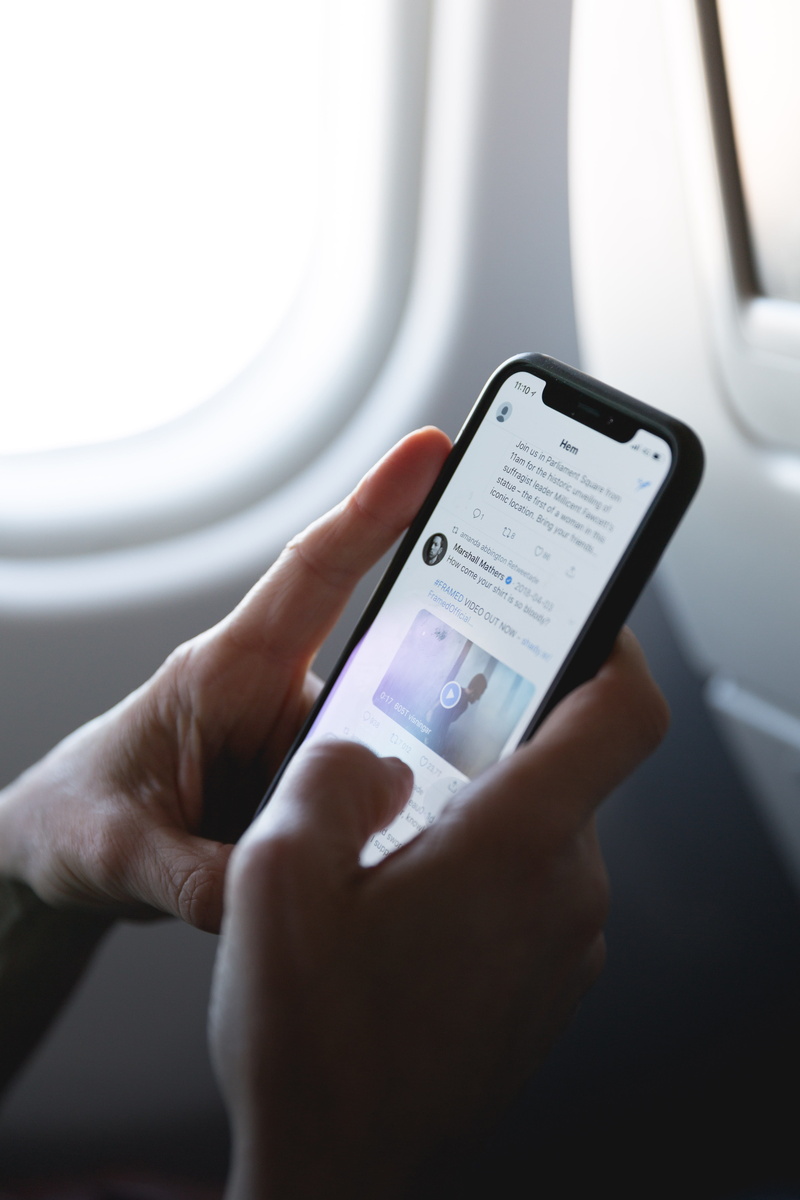 transportation, human hand, hand, smart phone, human body part, tweet, travel, adult, twitter, smartphone, app, iphone, device, indoors, holding, x, hands