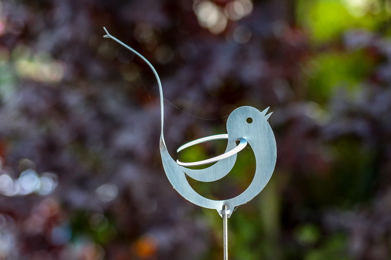 vertebrate, decorative, water, animal representation, representation, sea, animal, underwater, tweet, outdoors, plant, silver, animal wildlife, worm, chirrup