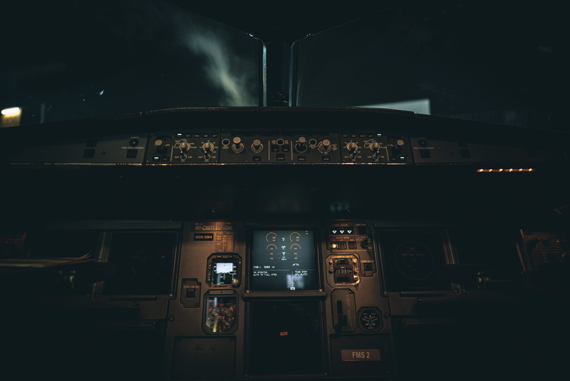 mode of transportation, dark, travel, sit, cockpit, illuminated, clouds, sky, indoors, dashboard, architecture, control, night, public transportation, nightlife