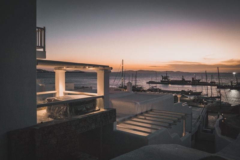 city, no people, alley, clear sky, building, sunset, mining, ocean, water, porch, scenics - nature, seat, sea, mode of transportation, waterfront, transportation