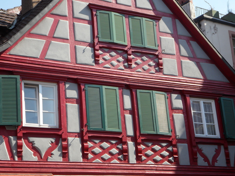 fachwerkhaus, architecture, sunlight, red, built structure, low angle view, glass - material, no people, nature, residential district, home, building, truss