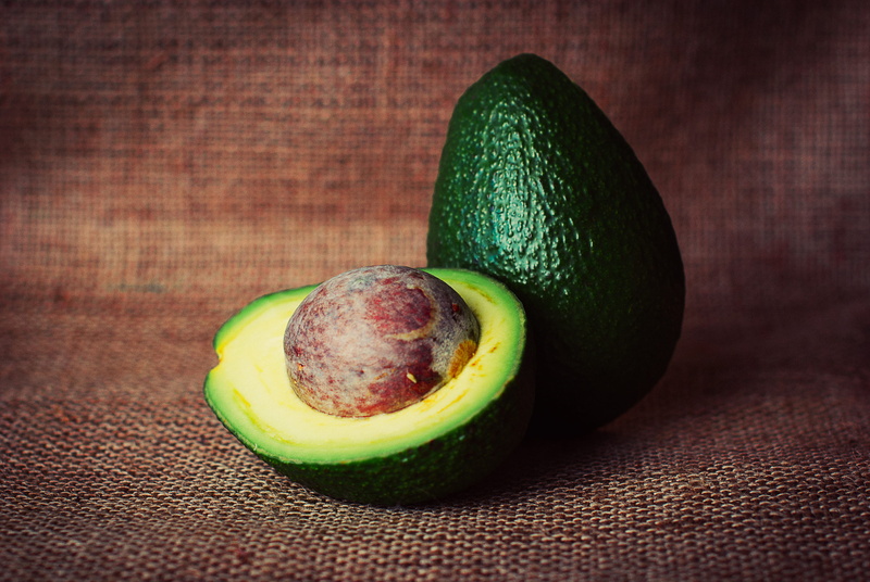 healthy eating, wellbeing, food and drink, close-up, freshness, 2K, wood - material, indoors, food, no people, seed, avocado, halved, table, cross section