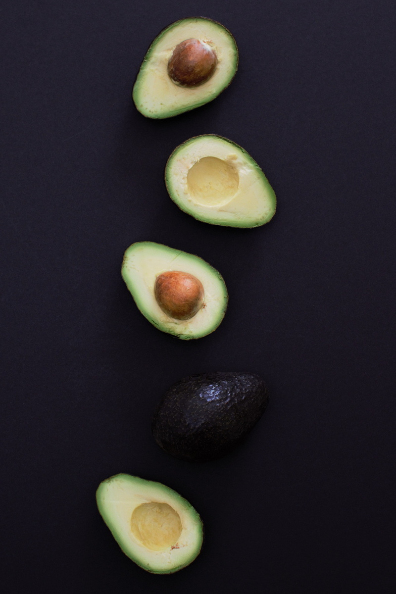 indoors, wellbeing, group of objects, healthy eating, high angle view, avocado, freshness, still life, ripe, food and drink, fruit, food, close-up, slice