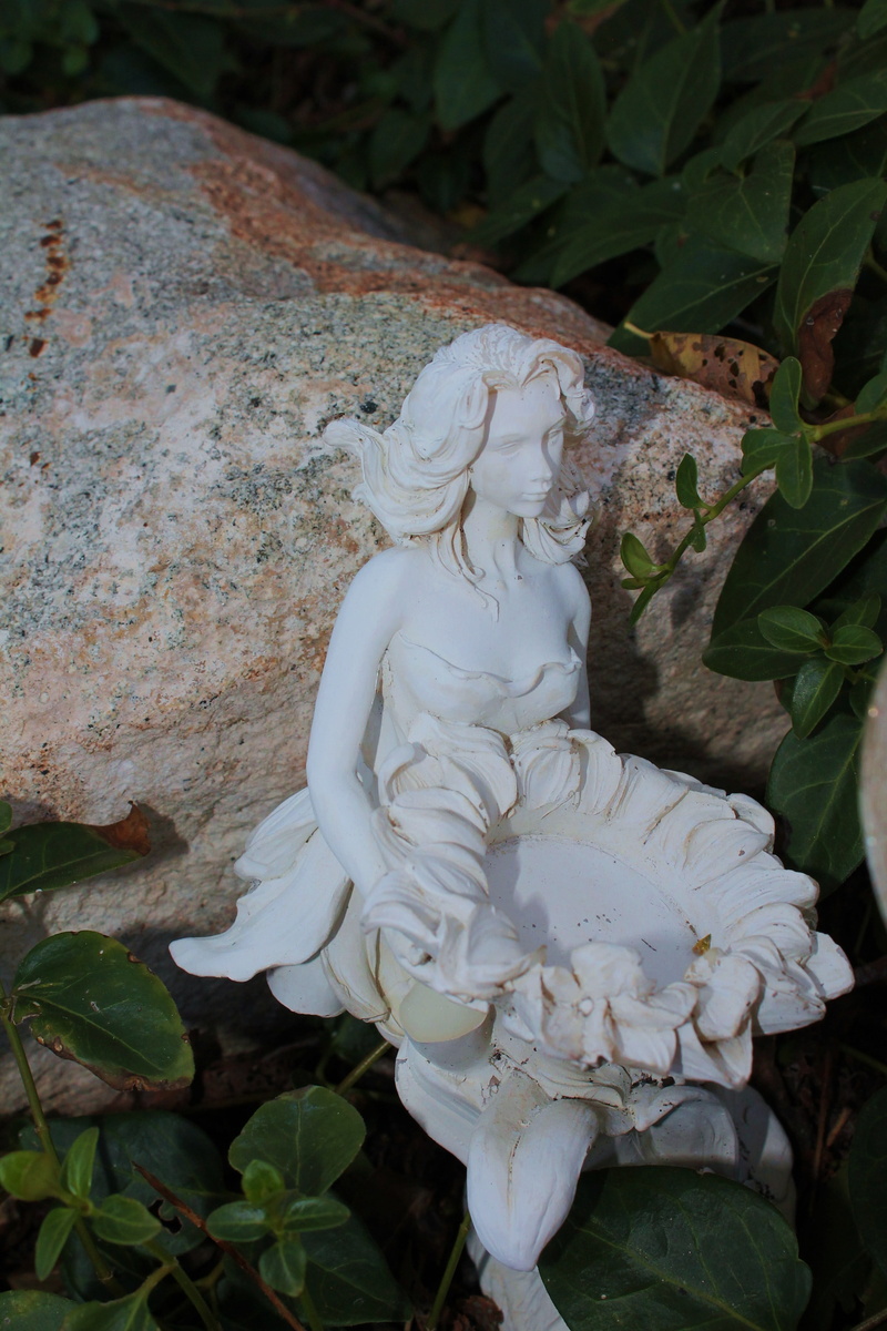mythical, sculpture, female, white color, fairy, elemental, outdoors, fantasy, rock, freshness, beauty in nature, amber avalona, ivy, growth, childrens story
