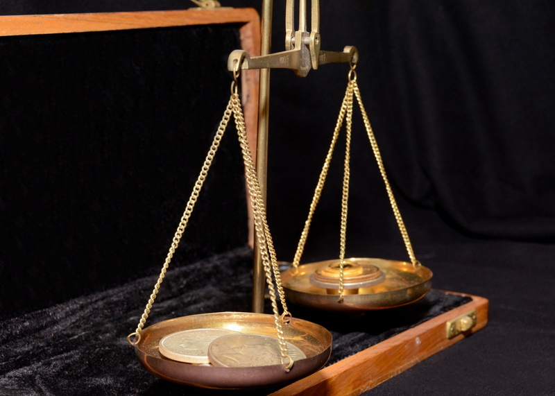 business, small group of objects, no people, indoors, tool, old, instrument, weight, photo, apothecary, justice - concept, black background, legal system