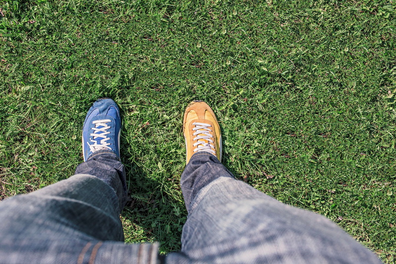 standing, person, man, body part, day, field, nature, real people, human foot, low section, lifestyles, comparison, grass, personal perspective, plant