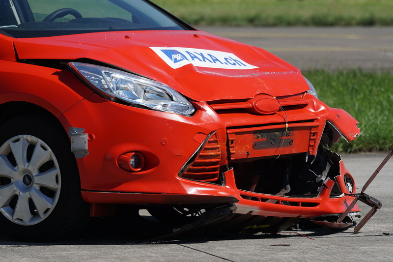 wrecked, road, mobile phone, smartphon, stationary, side view, motor vehicle, mode of transportation, tire, focus, day, no people, collision, wheel, city