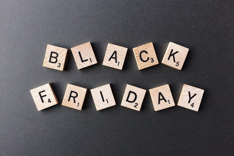 discount, signage, close-up, capital letter, large group of objects, black, directly above, shopping, toy block, sale, text, still life, black friday, gray background