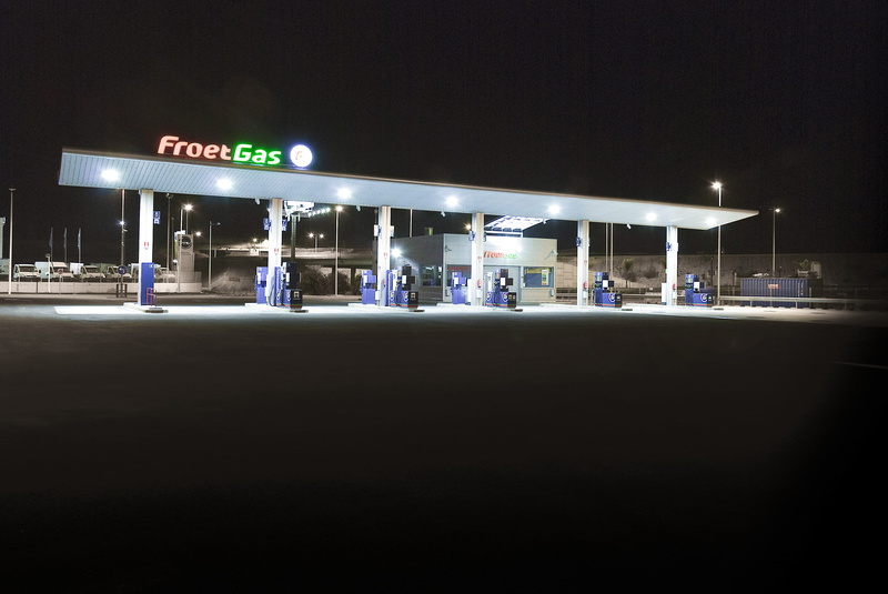 transportation, Gas, group of people, night, airport, journey, text, froet gas, incidental people, building exterior, Petrol Station, 2K, illuminated