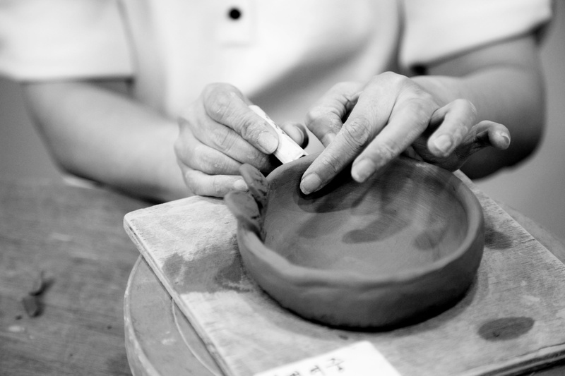 pitcher - jug, making, traditional, skill, creativity, art and craft, hand, adult, workshop, indoors, ceramics, human hand, work, qualitative, craft, working