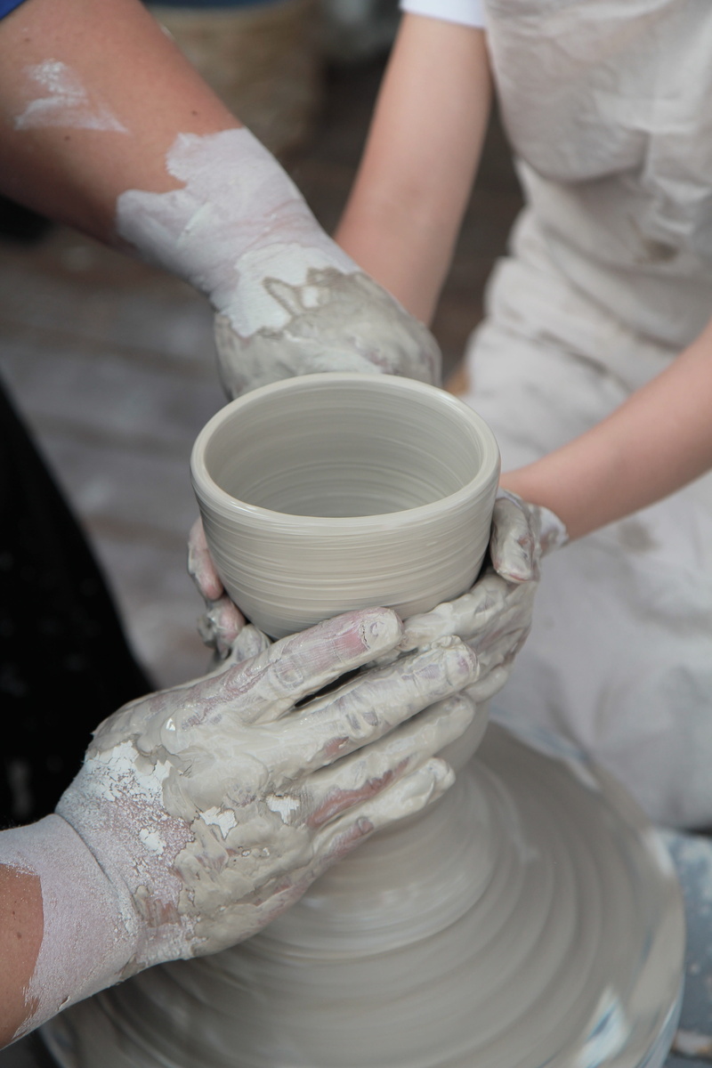 molding a shape, women, skill, finger, human hand, porcelain, pottery, adult, qualitative, craft, holding, two people, 5K, creativity, hand-made, expertise