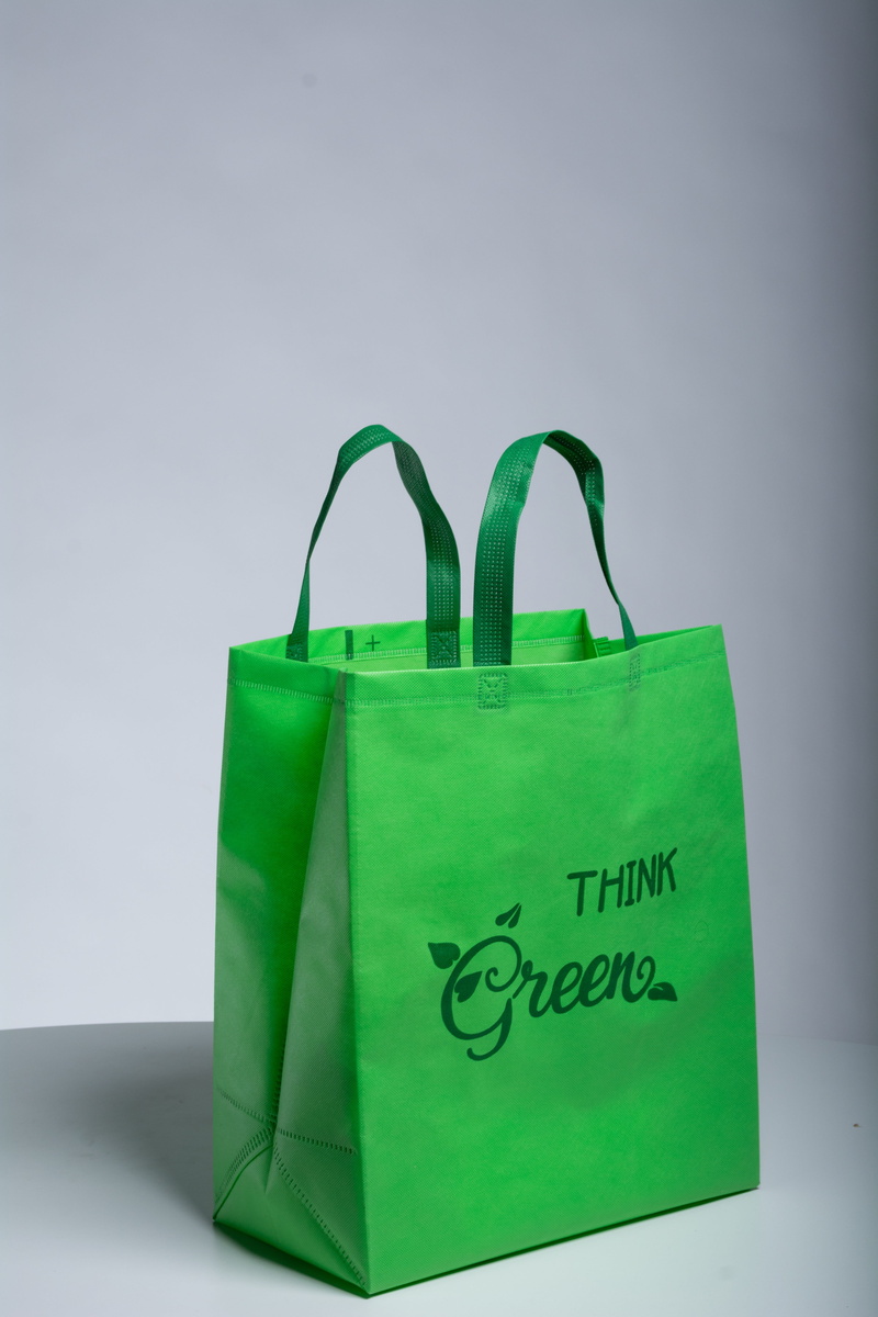 western script, sale, no people, eco friendly bags, cut out, shop, shopping bags, studio shot, shopper, merchandise, non woven bags, still life, gray, shopping