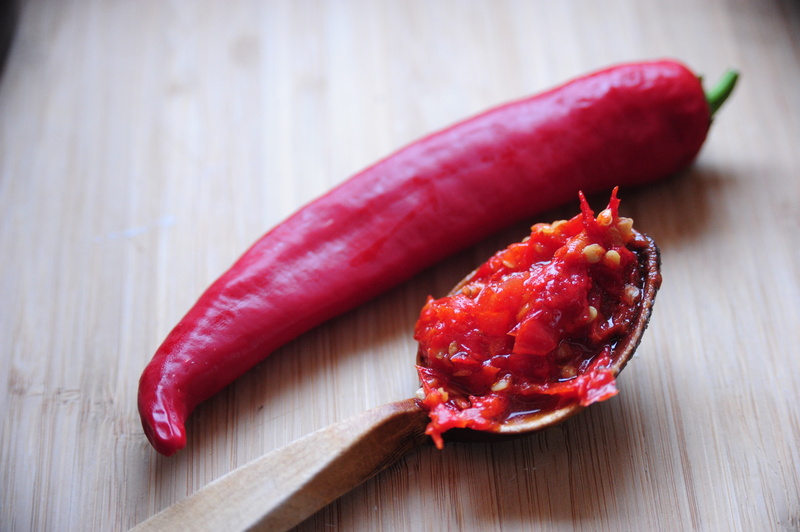 high angle view, spicy food, freshness, table, spices, red chili pepper, red, 4K, indoors, hot pepper, studio shot, food, no people, kitchen, fruit, focus on foreground