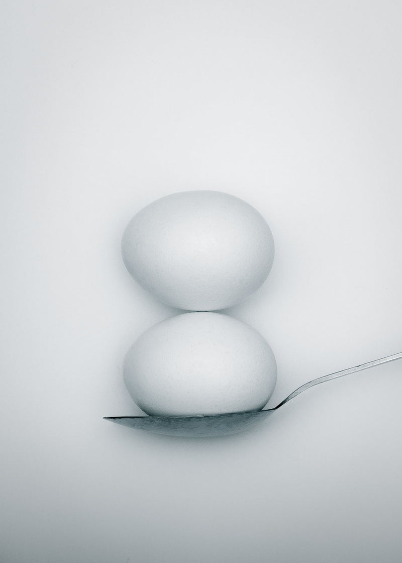 balancing, indoors, food and drink, eggs, spoon, white background, cut out, close-up, sparse, studio shot, animal egg, boiled, freshness, white color, fragility