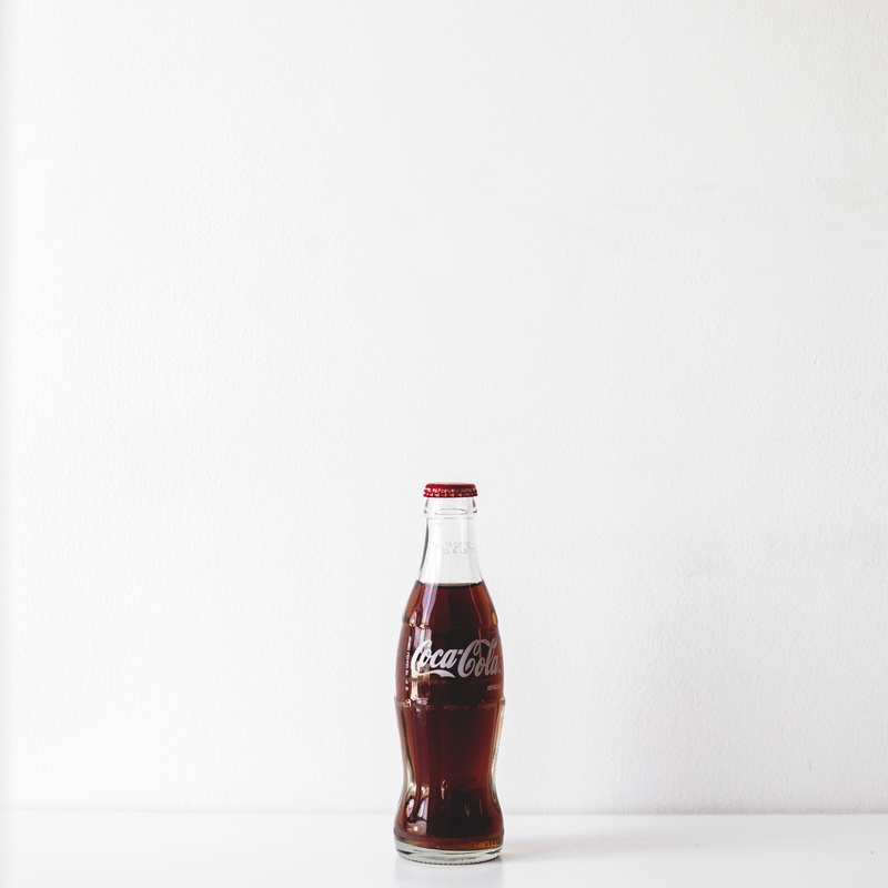 airtight, refreshment, cola, glass - material, unopened, no people, glass, food, spice, white, food and drink, container, coca cola, soft drink, copy space