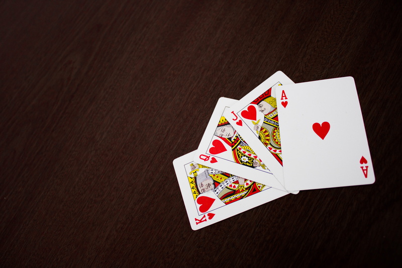 no people, game, ace, cards, wood grain, symbol, copy space, wood - material, still life, high angle view, success, leisure games, poker cards, indoors