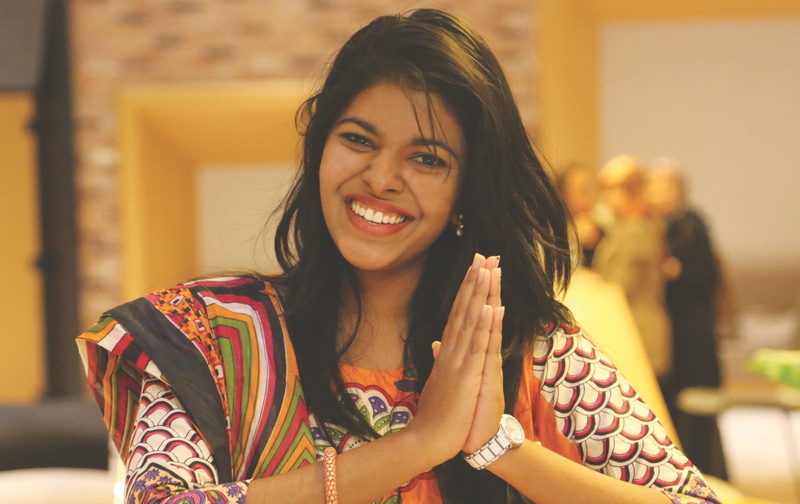 adults only, happiness, focus on foreground, toothy smile, cheerful, teeth, hairstyle, care, gratitude, one person, hands together, women, dress, and white