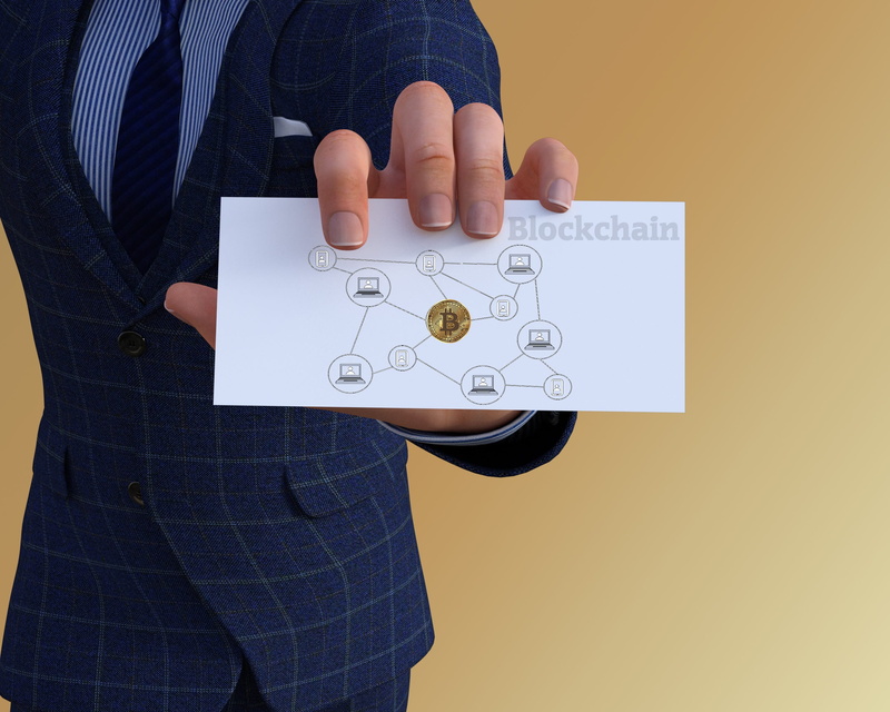 business person, connection, studio shot, block, symbol, indoors, adult, one person, males, commerce, company, men, banking, network, bitcoin, occupation