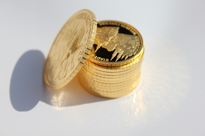 studio shot, coins, gold coin, metal, colored, reflection, shadow, economy, stack, wealth, indoors, 5K, white background, investment, savings, still life