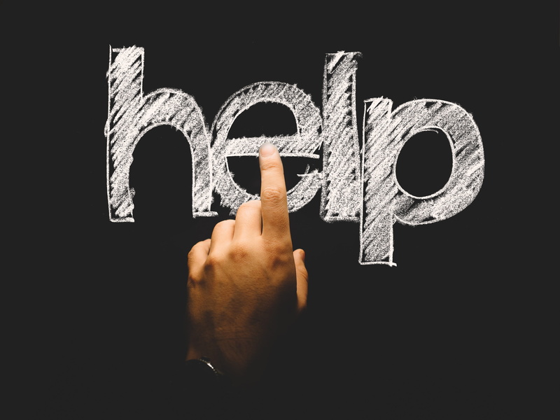 Help, copy space, Touch, handwriting, real people, studio shot, body part, global communications, illuminated, symbol, request, text, human hand, unrecognizable person