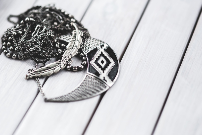 table, locket, necklace, single object, items, decoration, pattern, christmas, indoors, pendant, creativity, still life, selective focus, close-up, organizer