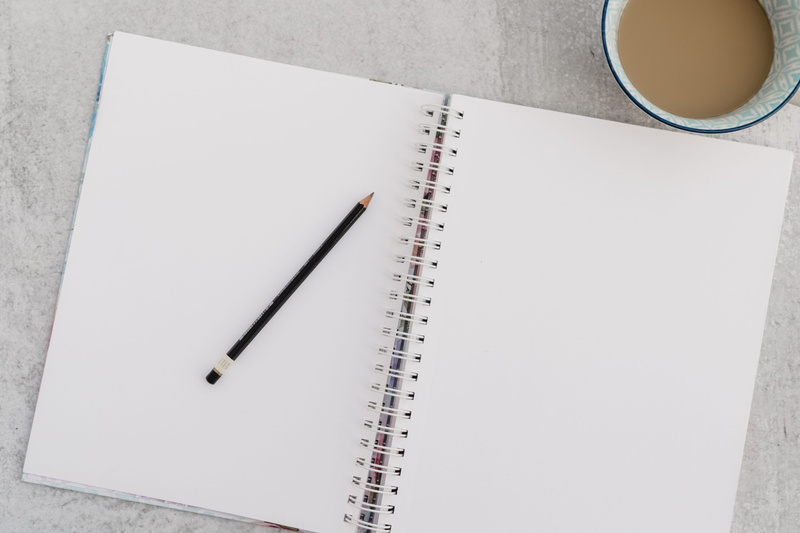 text, art class, cup, note pad, drawing pad, high angle view, book, diary, coffee mug, black, drawing, directly above, coffee - drink, pencil, still life