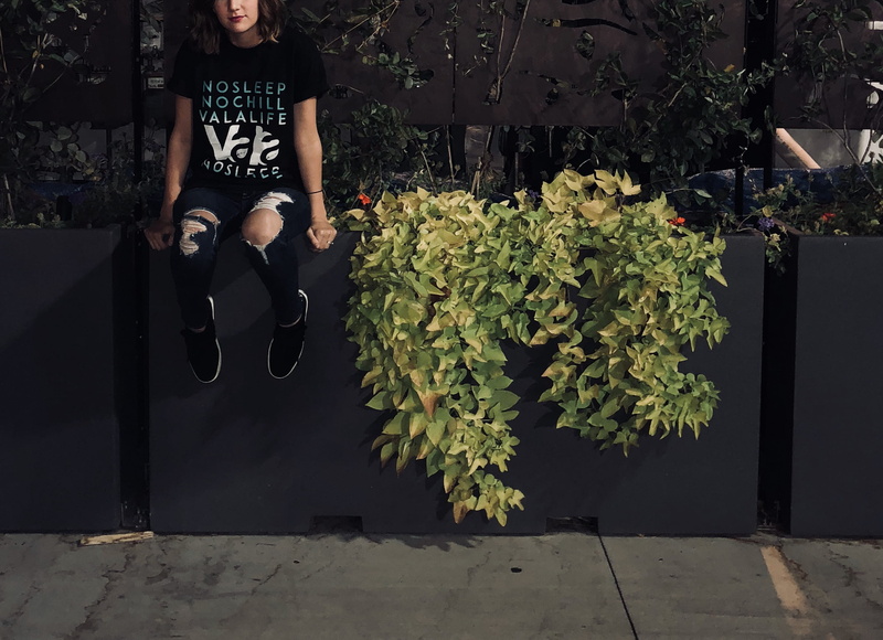 casual clothing, sunlight, architecture, young adult, outdoors, person, front view, young women, girl, wall, lifestyles, green, fall, tumblr, sitting, green color