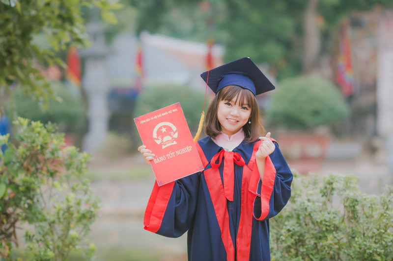 celebration, happiness, university, women, waist up, academic, child, cover, looking at camera, college, woman, education, graduation gown, 5K, portrait
