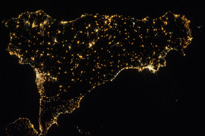 stars, backgrounds, light - natural phenomenon, orbiting, no people, black background, exploding, island, outdoors, night, celebration, ocean, mediterranean