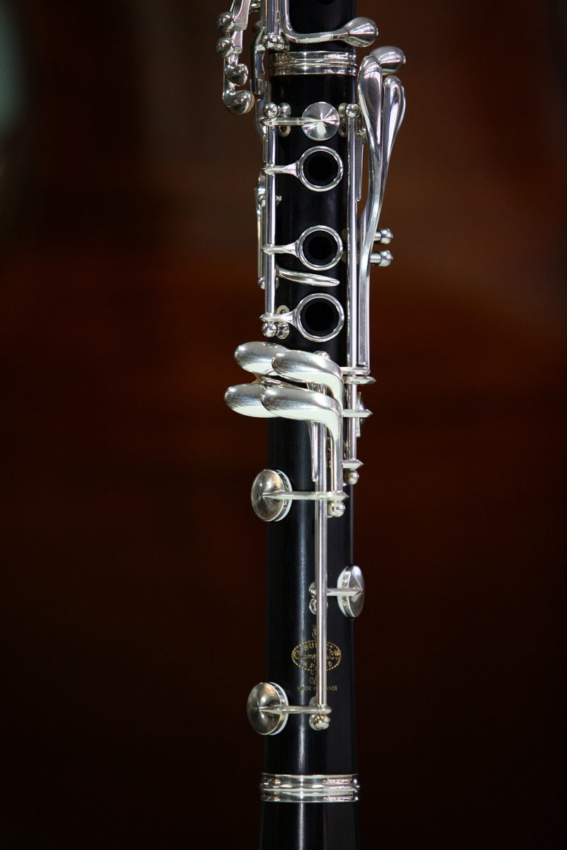 single object, musical equipment, black background, day, classic, black, studio shot, metal, focus on foreground, religion, jazz music, photo, close, Instrument