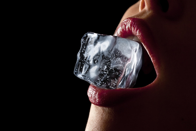 hand, mouth open, ice cubes, lipstick, women, body part, human face, beautiful woman, human mouth, copy space, black background, drinking, food and drink