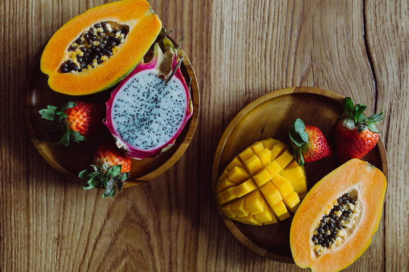 breakfast, mango fruit, seed, choice, directly above, high angle view, sweet, fruits, wooden, exotic, no people, wood - material, indoors, organic, fruit