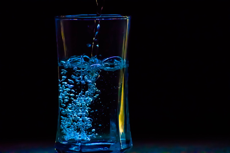 drop, blue, no people, black background, room, clear, party, glass, bar, food and drink, filling, liquid, splashing, alcohol, science, water, icee, refreshment