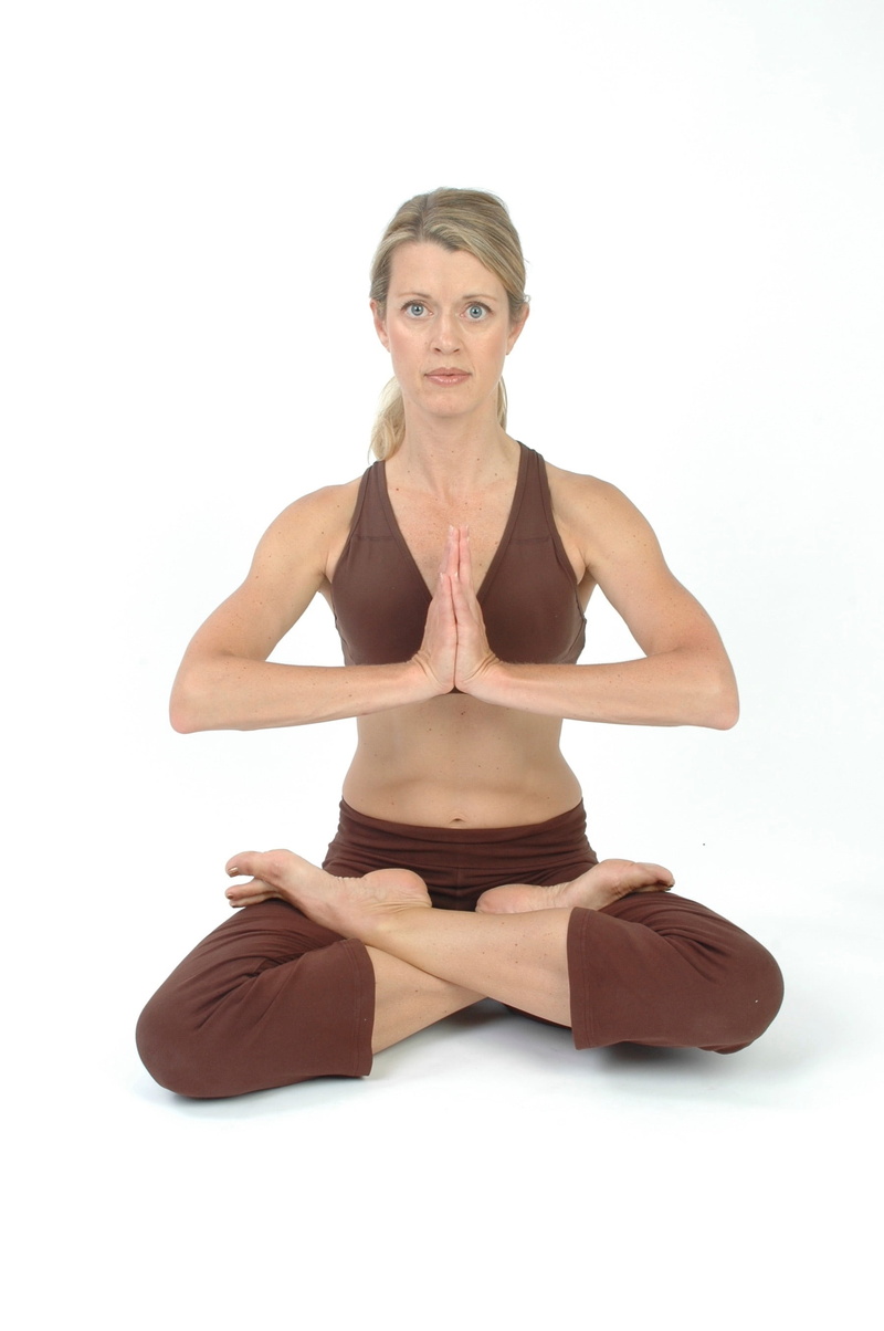 calm, looking at camera, adult, only women, cut out, organic, full length, exercise, pilates, physical activity, front view, one person, spirituality, sitting