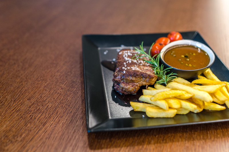 food and drink, fried, wood - material, ceramic, no people, close-up, ready-to-eat, lunch, meat, potatoes, potato, table, steak, food, mouth-watering, fast food
