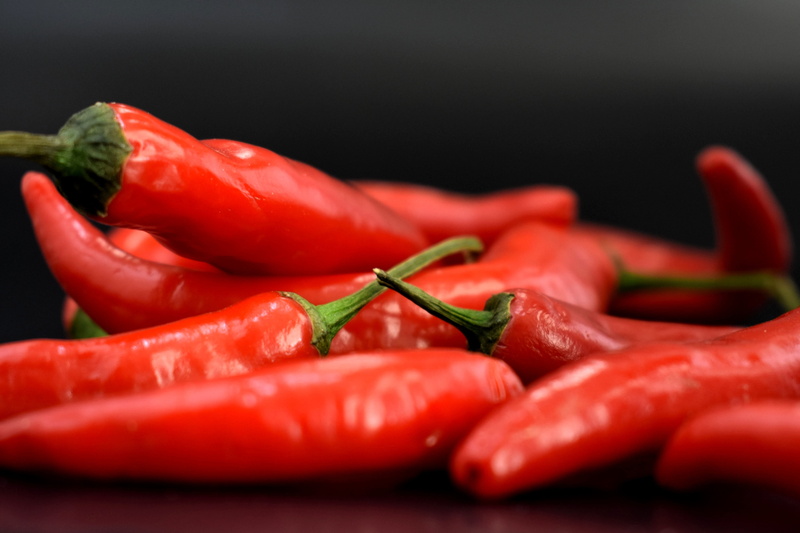 freshness, sharp, ingredient, capsicum, chile, ripe, black background, large group of objects, group of objects, vegetable, red, spices, chili pepper, food and drink