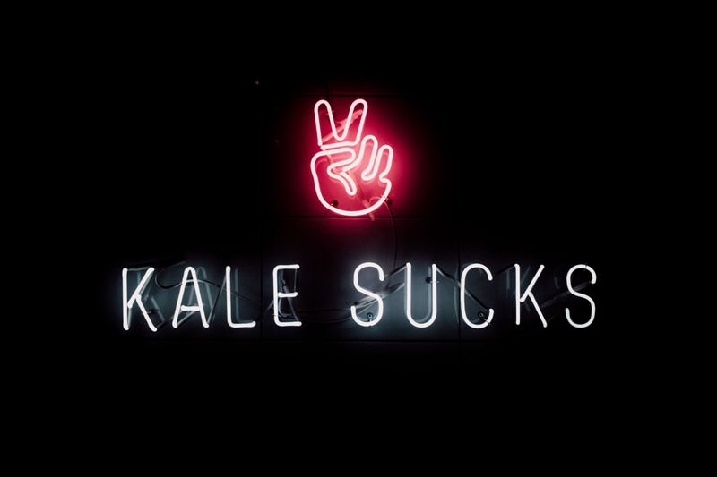 communication, sign, no people, business, studio shot, number, indoors, illuminated, sucks, dark, western script, lighting equipment, signage, red, text