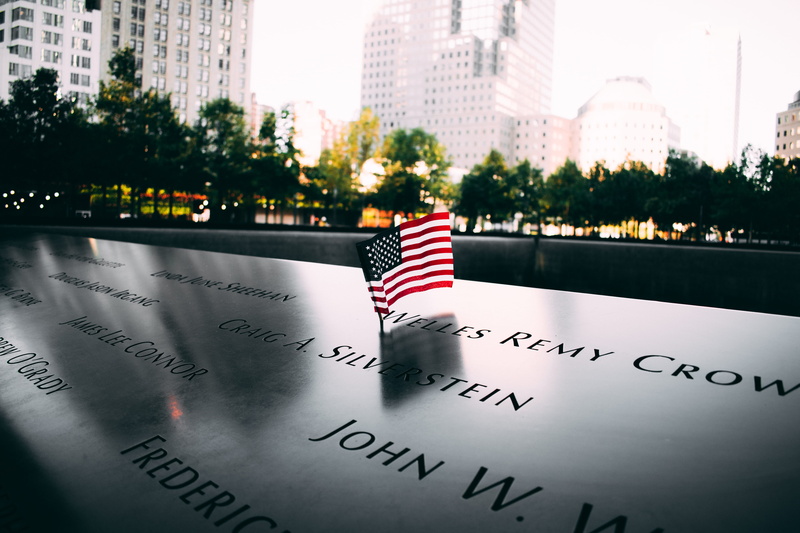 commemorate, communication, tourist attraction, street, gray, built structure, skyscraper, road, no people, office building exterior, building, blur, honor