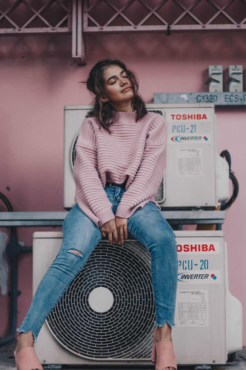 leisure activity, air, teenager, indoors, jeans, young women, industrial, white, girly, women, contemplation, one person, three quarter length, lifestyles
