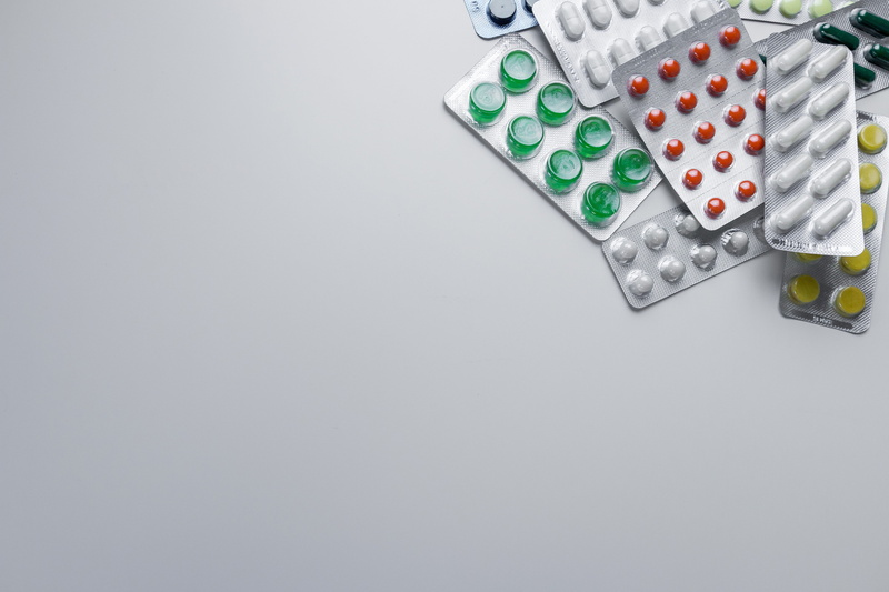 no people, dose, close-up, copy space, choice, gray, still life, medicine, prescription medicine, variation, blister pack, background, screen, healthcare and medicine