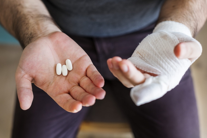 healthcare and medicine, finger, painkiller, close-up, injured, hand, focus on foreground, painful, fingers, three, hurt, one person, front view, man, indoors