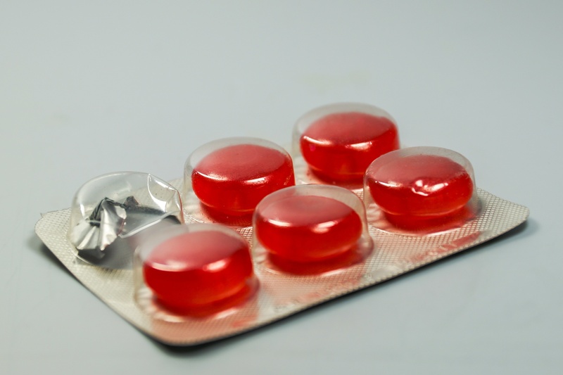 indoors, flu, blister, no people, cough, drug, pharmacy, nutritional supplement, capsule, lozenge, close-up, science, vitamin, white background, inside