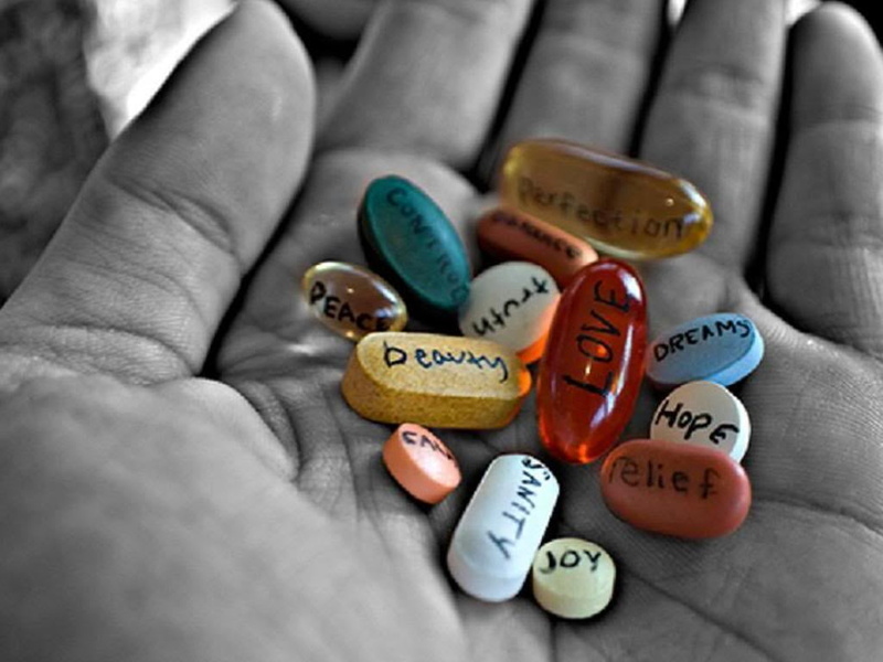 different, large group of objects, focus on foreground, indoors, hand, medication, body part, choice, human body part, message, pills, multi colored, Love