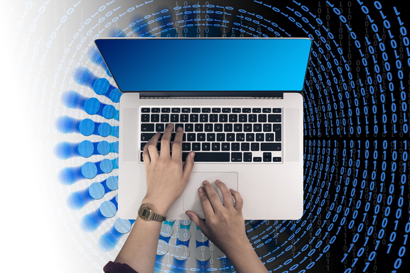 computer equipment, binary code, server, technology, high angle view, one person, wireless technology, binary, indoors, using laptop, internet, computer